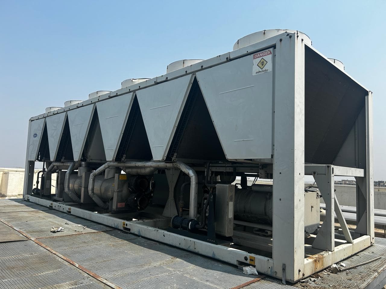 Aarohan Enterprises - Reinforced Concrete Crusher Operations: Crushing and sorting of reinforced masonry debris during industrial plant clearance. (Photo 026)